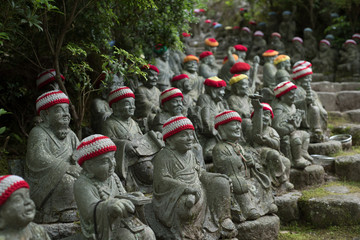 Small buddha statues at daisho-in Temple, Miyajima island , Hirosima, Japan.