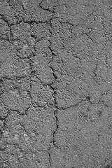 Asphalt road crack texture background for use. Cracks of concrete