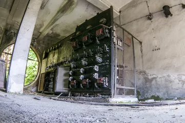 Fototapeten Verlassene Gebäude Old damaged fuse cabinet in abandoned building  © Юрий Бартенев