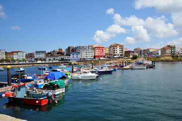 Fototapeta na wymiar Camarinas, GALICIA, SPAIN - JULY 11, 2018: The port of Camarinas with fishing boats