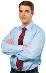 Friendly Businessman Standing with Arms Folded - Isolated