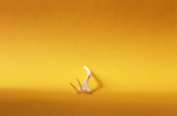 Folded table accessory.