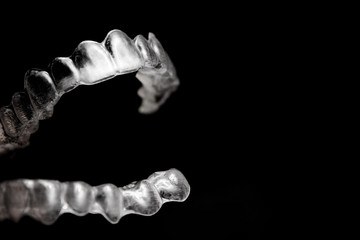 Transparent dental orthodontics to correct dental alignment