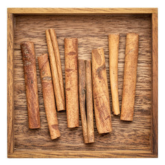 cinnamon sticks in a wooden box