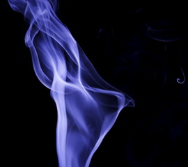 Naklejka premium Blue smoke on black background
