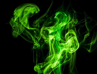 Green smoke on black background