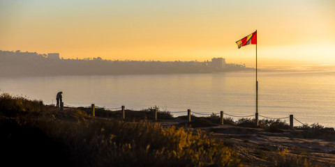 Blacks Beach overlooking Pacific Ocean at sunset