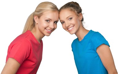 Portrait of Two Smiling Girlfriends / Sisters