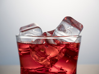 glass of cola with ice