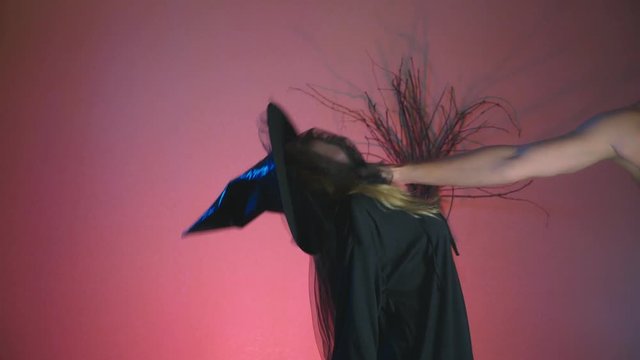 4k, slow-motion, halloween. The hand strangles the witch.