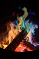 Fototapeta premium colourful campfire while camping