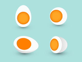 A set of sliced and half chicken eggs with yolk on blue background
