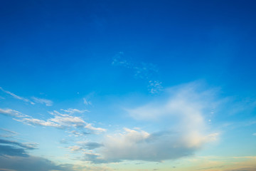 Fototapeta premium blue sky background texture with white clouds sunset.