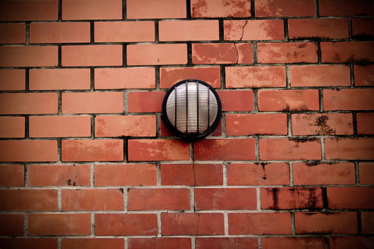 Old brick wall with lamp © yaisirichai