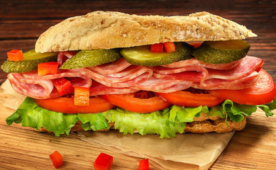 Sandwich with tomatoes, ham, salted, cucumber, pepper