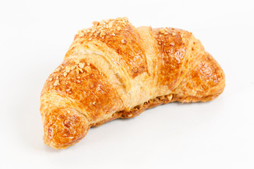 freshly baked croissant on white background. Tasty puff pastry dessert . Delicious pastries