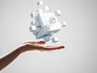 Cube white figure in male palm as symbol for integration. 3D ren