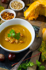 pumpkin soup on wooden surface