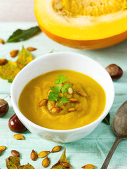 pumpkin soup on wooden surface