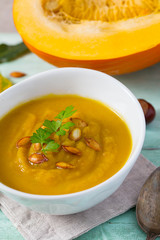 pumpkin soup on wooden surface