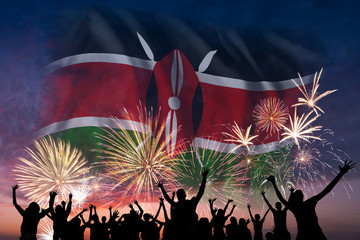 People are looking on fireworks and flag of Kenya