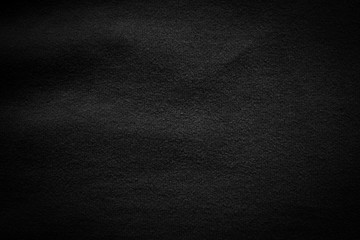 Black background abstract cloth texture luxury silk dark fabric.