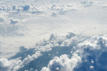 Sunny view of atmosphere above the clouds in Europe.