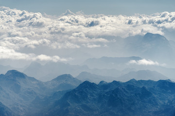 Obraz premium Sunny view of atmosphere above the clouds in Europe.