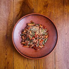 Stewed vegetables are seasoned with sesame seeds