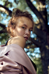 portrait of cute beautiful young girl with freckles close-up