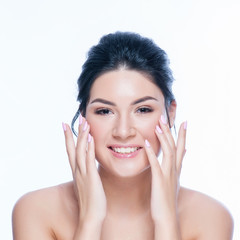 Beauty Woman face Portrait. Beautiful Spa model Girl with Perfect Fresh Clean Skin. Female looking at camera and smiling.