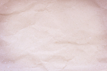 Fototapeta premium Wrinkle light brown paper patterns texture background