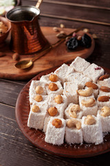 Turkish delight on a wooden table.