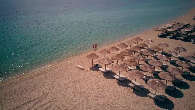 Family on beach aerial shot, Sithonia, Greece
