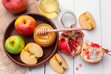 Apple and honey, traditional food of jewish New Year - Rosh Hashana.