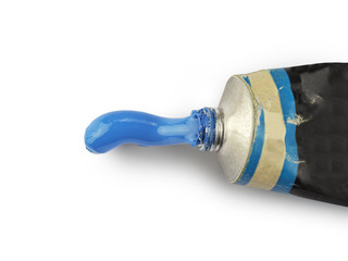 Old tube with blue oil paint, clipping path