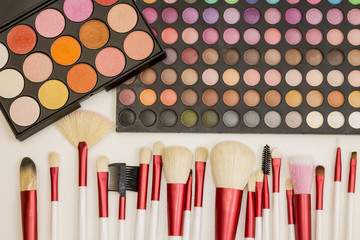 Colorful makeup set of eye shadows and brushes