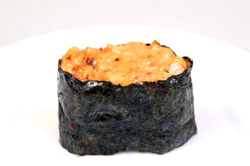 Spice sushi with smoked salmon. In nori seaweed.