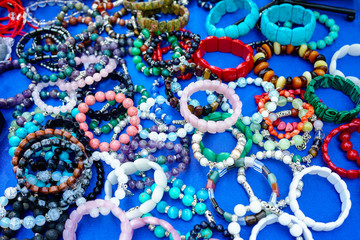 Jewelry made of natural stones on a blue background.