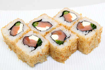 Uromaki. Sushi in the nori. Japanese food on a beautiful dish. Diet food.