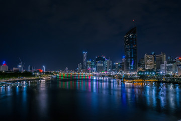 Fototapeta na wymiar River at cloudless night in city