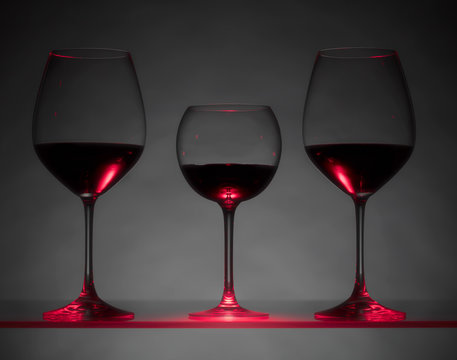 Glasses of red wine .