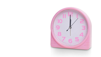 old pink alarm clock on white background,copy space