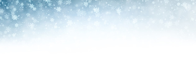 Blue blurred winter banner with snow pattern.