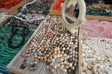 Glass beads at the flea market (Flohmarkt am Naschmarkt) in Vienna, Austria. April, 2008.