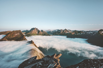 Mountains and clouds waterfall landscape aerial view in Norway Travel locations tranquil scenery Senja islands