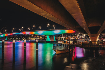 Fototapeta na wymiar Under bridge view to Brisbane at night
