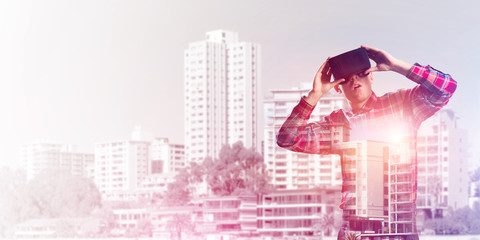 Guy wearing checked shirt and virtual mask demonstrating shock or surprise