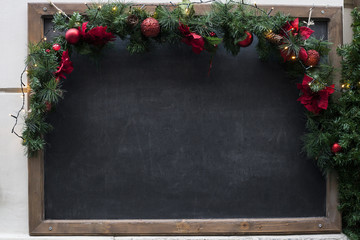 Fototapeta na wymiar Dirty school blackboard. Christmas empty black mock-up