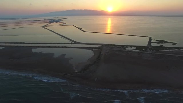 Aerial shot of Ebro Delta estuary and rice fields. Europe, Spain, Catalonia, Province of Tarragona, Terres de l'Ebre, Deltebre, Punto de la Banya 
